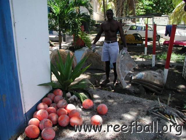 Michael at Cast aways cleaning mould to be ship to coconut 