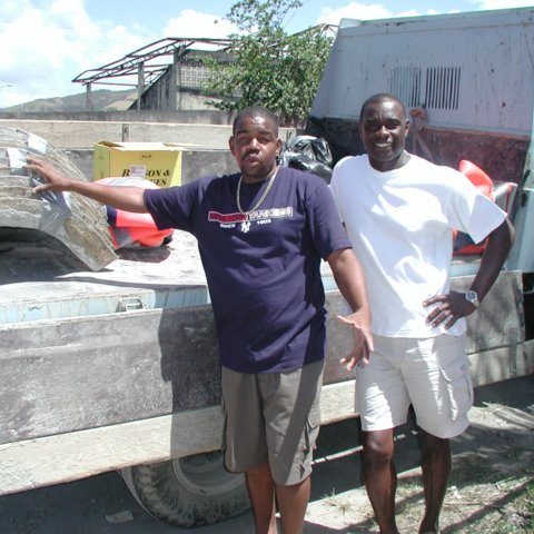 Naseem and michael placing Moulds on the truck to be shipped Naseem and michael placing Moulds on the truck to be shipped