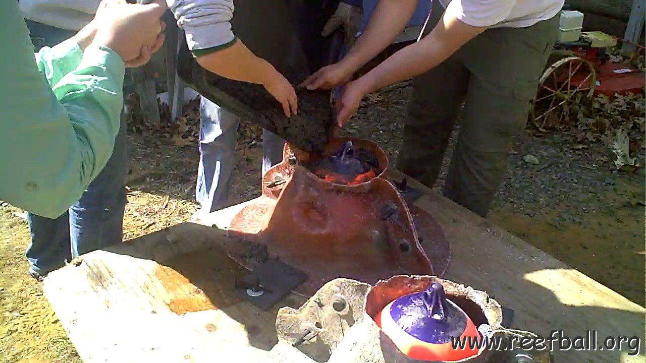 pouring cement into molds