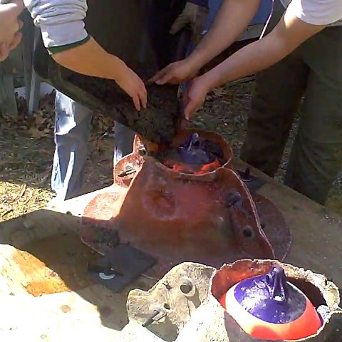 pouring cement into molds