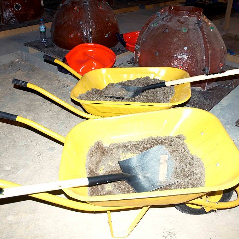 Wheelbarrow with Sand and Shovel